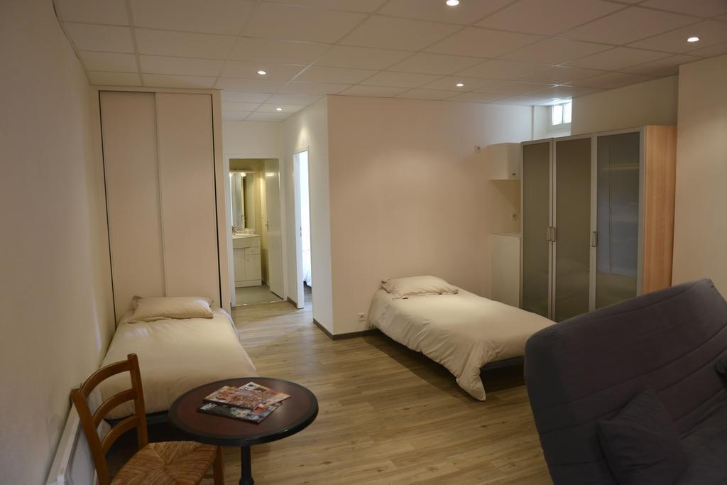 Hotel Des Arceaux Saint-Sever  Bagian luar foto